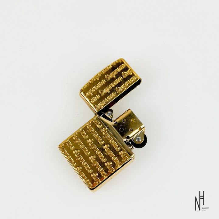 Supreme Repeat Engraved Zippo Gold