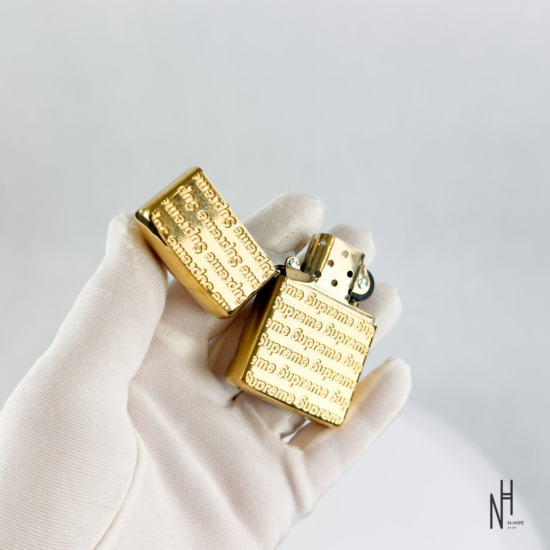 Supreme Repeat Engraved Zippo Gold