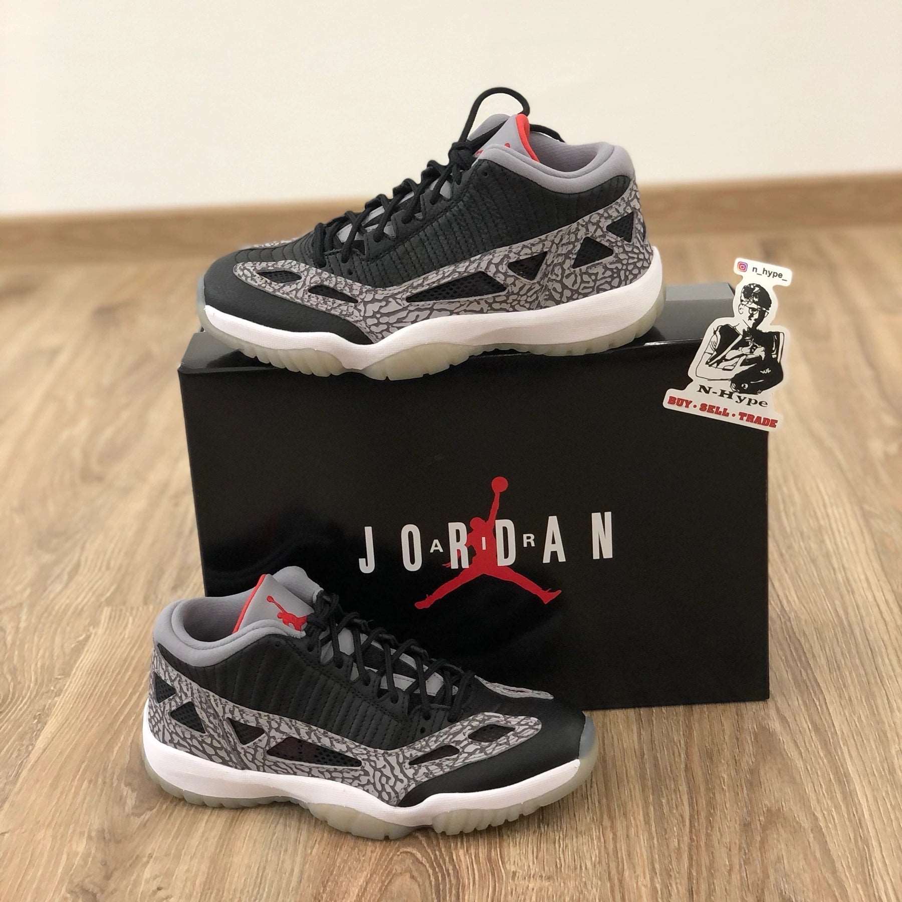 Jordan 11 hotsell black cement