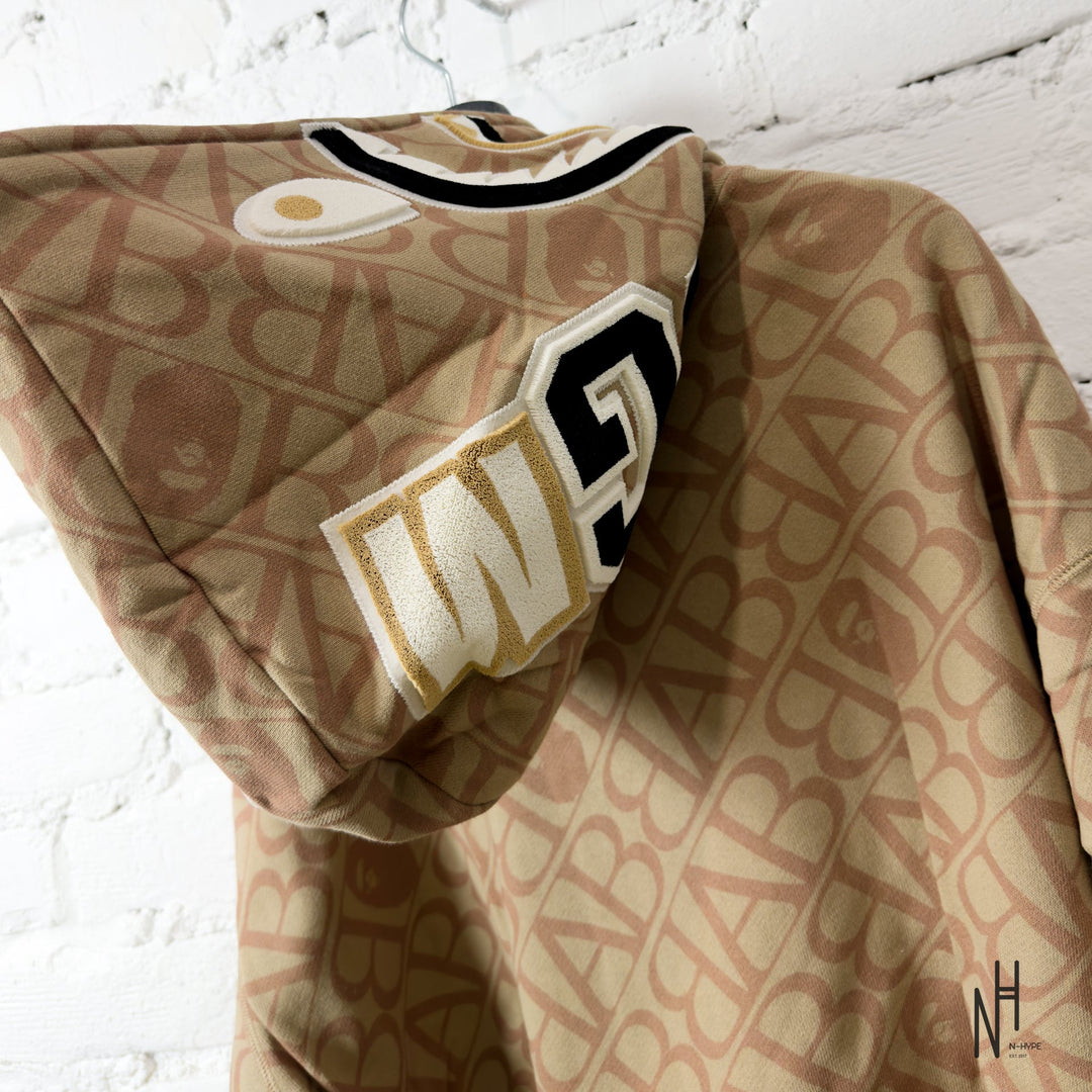 BAPE Sport Monogram Shark Hoodie Beige N-Hype streetwear hoodie beige with monogram shark design.