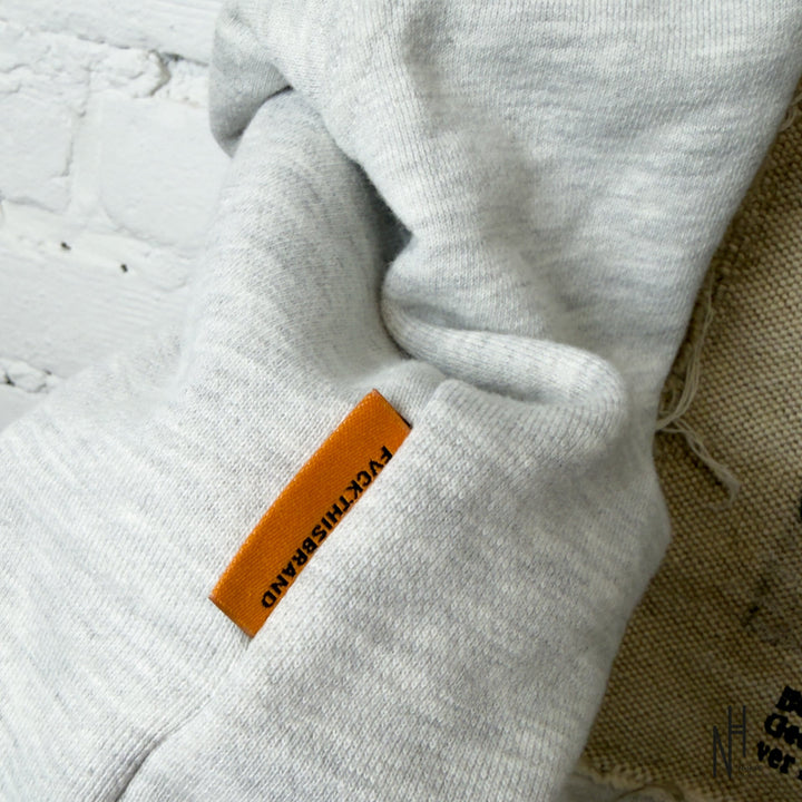 FVCKTHISBRAND Fight The Beast Hoodie Grey sleeve logo tag detail