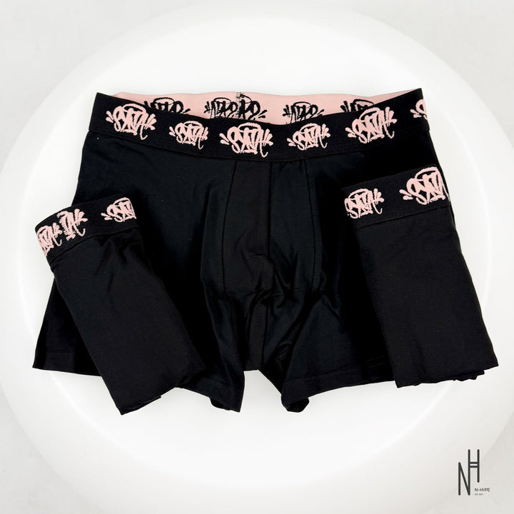 SynaWorld x Central Cee Boxers 3 Pack Black / Golden Rose męskie N-Hype streetwear boxersy czarne z różowymi detalami